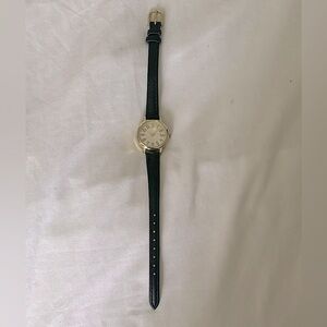 Vintage style gold watch black band